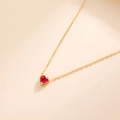 18k gold plated heart necklace featuring a vibrant magenta pink birthstone pendant - January - Garnet