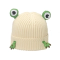 Detail of cream knit beanie showing green cartoon frog eyes and 3D stuffed hand accents - M (56-58cm) / Beige