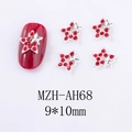 Vue macro de bijoux d'ongles en forme d'étoile rouge 9x10mm avec détails en argent - Double Étoile (AH68)