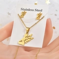 Golden stainless steel jewelry set featuring angel silhouette necklace and stud earrings - Gold Angel