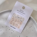 3D silver nail charms MJ-055 with pearls and rhinestones on white packaging card - Model MJ-055 Silver Foil
