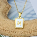 Gold square Pisces zodiac necklace with white shell inlay on a rectangular pendant - Pisces