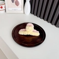 Pink and yellow bicolor plush shark hair claw clip displayed on a wooden tray - Light Yellow + Orange Pink