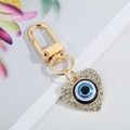 Golden heart-shaped evil eye keychain with blue enamel and sparkling crystals - Gold Heart 10