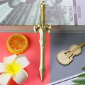 Golden sword-shaped metal stationery pen with detailed relief and top hanging loop - Sword Pen - Gold / 0.5mm