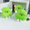 Close-up of cute green plush coin purse with smiling embroidery and metal chain strap - Happy Little Green Coin Purse
