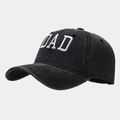 Vintage washed cotton baseball cap with white DAD embroidery in a 45-degree side view - Soft Top Solid DAD Black
