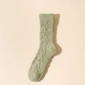 Soft light green coral fleece thermal crew sock for winter warmth on a beige background - One Size / Mustard Green
