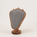 Detail view of wooden shield necklace display stand with gray velvet padding insert - Walnut Grey Velvet