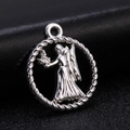 Silver alloy round zodiac pendant featuring an intricately engraved winged angel motif - Style 1 / Antique Silver