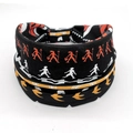 Elastic wide headband with African tribal silhouette and geometric pattern in black and red - Style 25