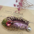 Elegant gold feather brooch with purple and green enamel, pink gemstone and pearl - Purple Feather