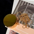 Mini borsa tonda in acrilico dorato con catena ed elegante finitura a specchio - Oro