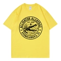 Detail of a bright yellow crew neck t-shirt featuring a black alligator graphic print - Yellow 317