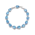 Macro shot of silver water drop bracelet featuring blue stones and zircon stones - Aqua