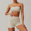 Women's beige brushed yoga set featuring a strapless sports bra and high waist shorts - S / Top And Bottom / Oat Apricot
