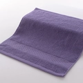 Soft purple cotton towel featuring a wide honeycomb weave border for high absorption - 34x34cm / Lilac Stone