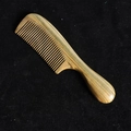 Natural sandalwood wide tooth hair comb with ergonomic round handle on black background - Style 2/Length 18cm
