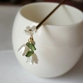 Golden hair stick with white cherry blossom and lily of the valley shell petals - White Water Chestnut (Metal)