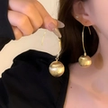 Golden drop hook earrings featuring spherical starburst texture pendants for women - Gold