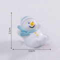 Miniature Christmas snowman figurine in blue hat laying on snow landscape, 3.6cm width - No.6 Sliding Snowman