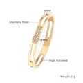 Detailed view of gold stainless steel bangle with diamond inlay and 58mm inner diameter - 8mm Gold