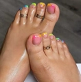 Detail of gold toe ring set with star and heart cutouts on rainbow french pedicure - Rainbow French Line Style (FW123) / Jelly Glue + Nail File