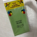 Green disposable plastic party tablecloth in packaging, 137x183cm size for celebrations - 54x72 Inch / Grass Green