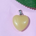 20mm yellow natural stone heart pendant with silver bail on a soft pink background - 60-Glass Yellow