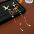 Vintage gold bird brooch with rhinestone wings and elegant pearl tassel chains - Gold