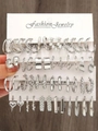 Silver-finish jewelry set with diverse hoops, heart pendants, and pearl accents on card - 60 White K (DZ-1006)