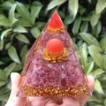 8cm crystal pyramid with pink stones, golden lotus, and red sphere in resin - 8cm / Red Cat's Eye Strawberry Quartz Lotus