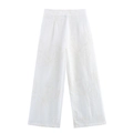 Pantaloni larghi in lino bianco con ricami floreali dettagliati in vista piatta - XS / Pantaloni Bianchi