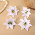 Set of four white artificial poinsettia flowers with yellow centers on beige background - 7-Point Poinsettia / 12cm / White