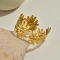Golden stainless steel cuff bracelet featuring multi-head sunflower design in a vintage style - Gold Daisy Open