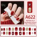 Sparkly gold Christmas deer press-on nails with red snowflake art and 24-piece nail kit - A622 / Glue Type