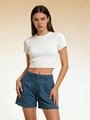 Front full view of white knit crop top and high-waisted blue denim shorts on a model - S / Aqua