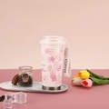 Pink blossom 316 stainless steel coffee tumbler with floral print and carrying strap - Summer White Cherry Blossom