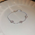 Silver flower tennis bracelet with rose charms and sparkling cubic zirconia stones - Bracelet #83 - Silver - Flower.