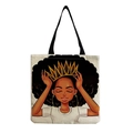 Detail of beige canvas tote bag with artistic black woman portrait and black handles - Afro Lady Portrait-Golden Crown