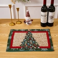 Detailed view of jacquard Christmas placemat with festive tree pattern on wooden table - Christmas Tree