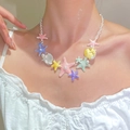 Collier avec étoiles de mer, coquillages et perles, bijou d'été pour femme porté au cou - Collier Océan Multicolore Argent Brillant (A-152)