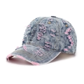 Close-up of distressed denim baseball cap with pink fabric lining inside torn holes - One Size / Blue Wash with Pink Distressed Lining (G)