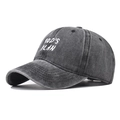 Classic washed gray cotton baseball cap with white GOD'S PLAN embroidery on white background - Black