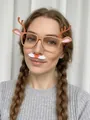 Close-up of reindeer Christmas party glasses with hanging beard accessory on a model - Coffee / Transparent Lens Antlers