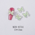 Close-up of cat eye opal butterfly nail art charm with zircon stone in silver frame - Pale Green Cat Eye Butterfly Silver Base (8734)