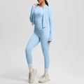 Detail of light blue yoga set featuring thumb holes on jacket sleeves and breathable fabric - Sky Blue