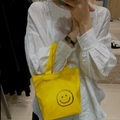 Mini canvas handbag in bright yellow with a black smiley face print and sturdy handles - 7*17*20*26cm (No Inner Bag) / Yellow