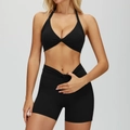 Women's black yoga set featuring halter neck crop top with twisted knot and high waist shorts - S / Top And Bottom / Bra + Shorts / Premium Black