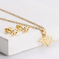 Golden titanium steel jewelry set featuring a double heart and arrow pendant design - Heart with Arrow